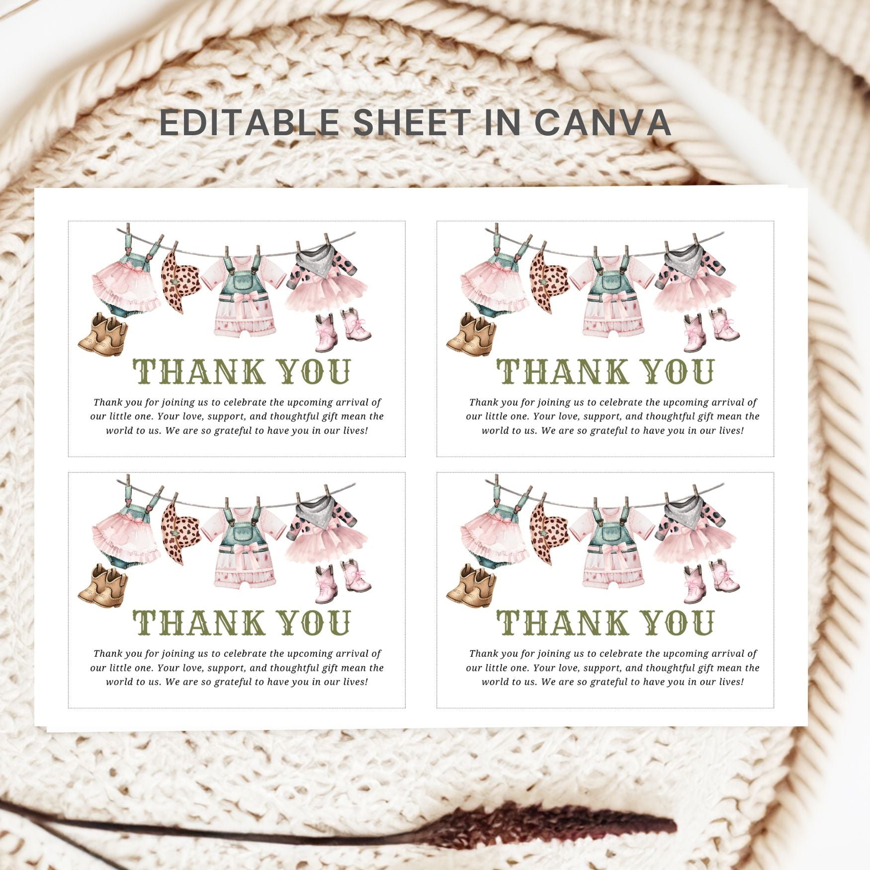 Three identical 'Thank You' cards with baby clothesline design on a textured surface.