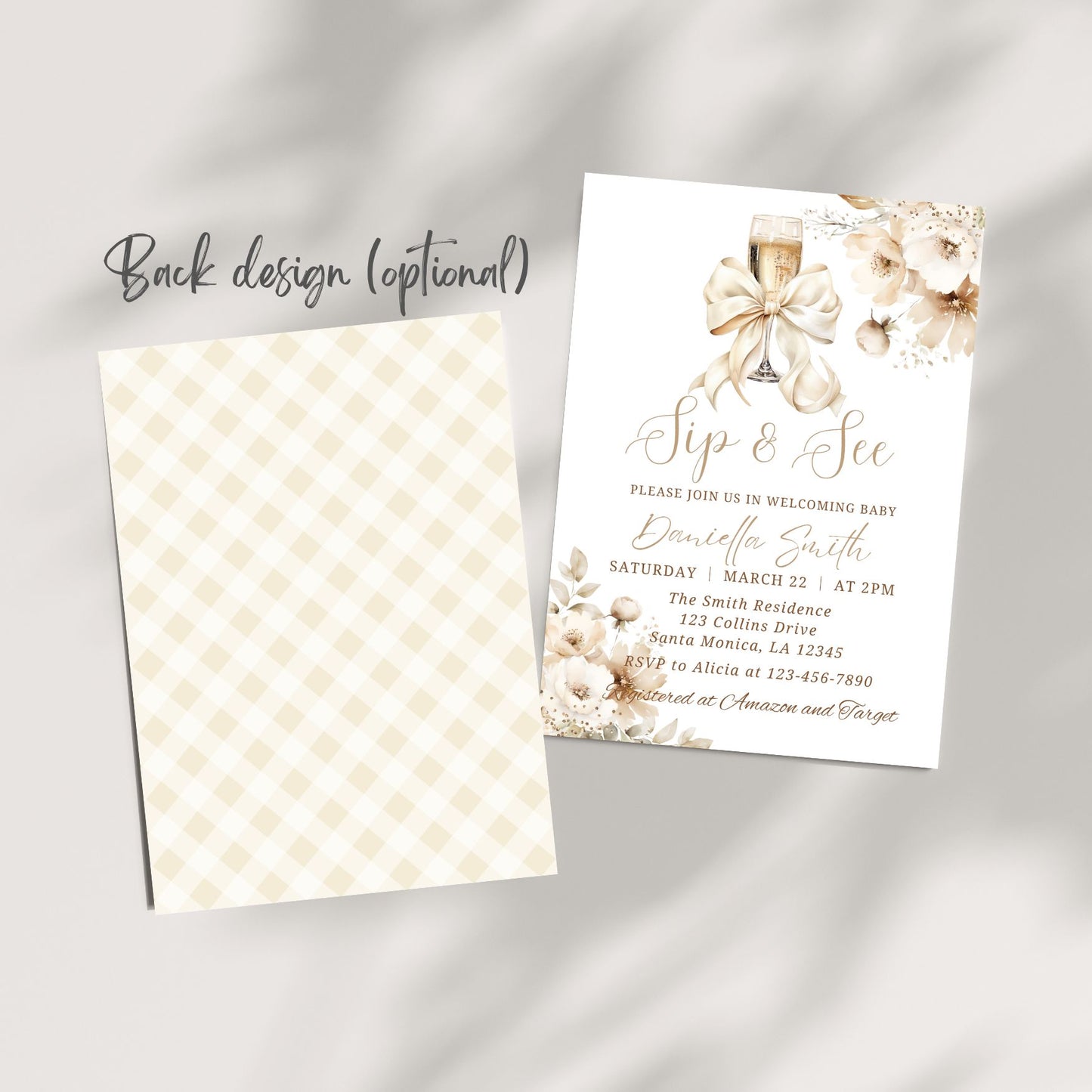 Baby shower invitation with champagne glass and bow design on a checkered card.