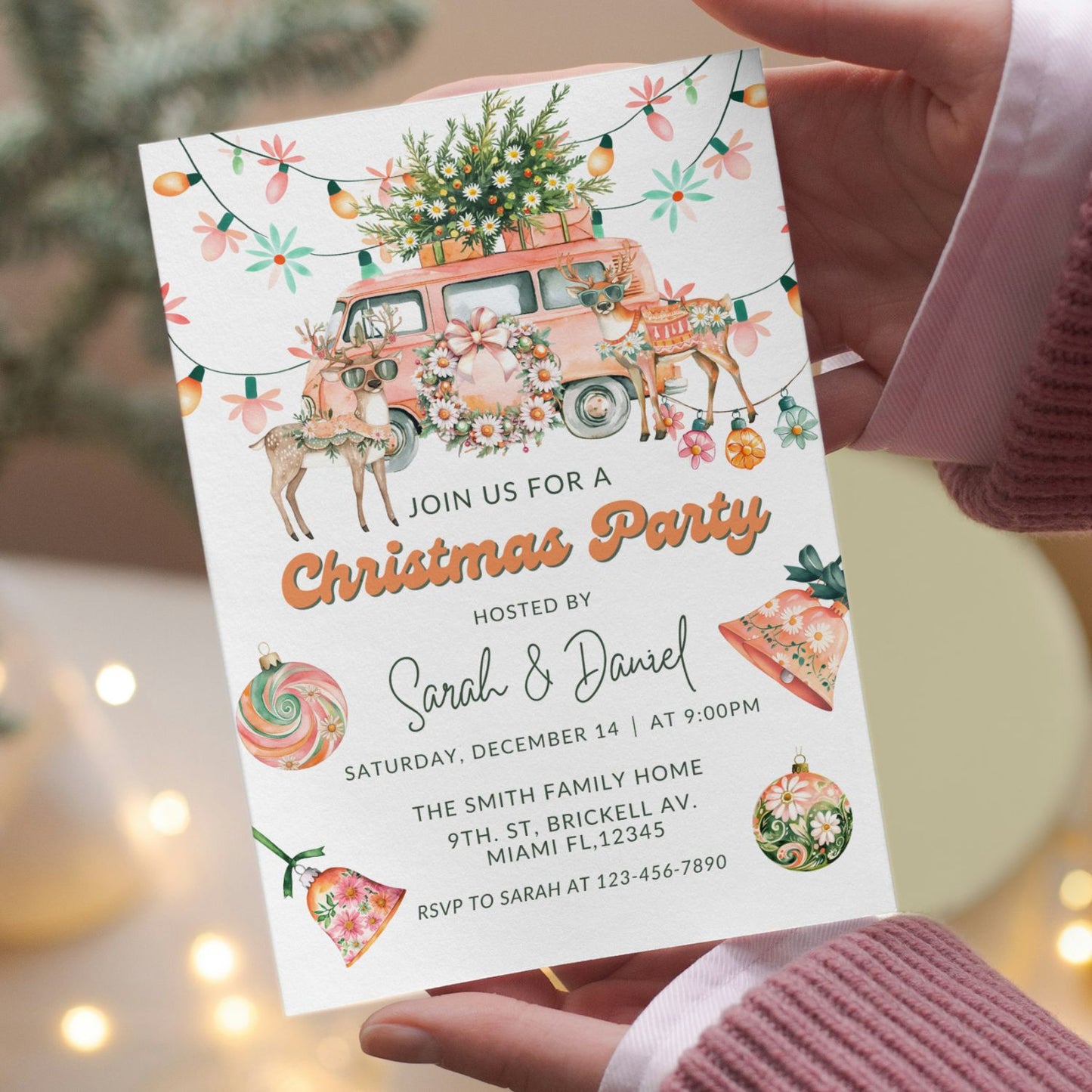 Hand holding a Christmas party invitation with festive elements and a pink van.