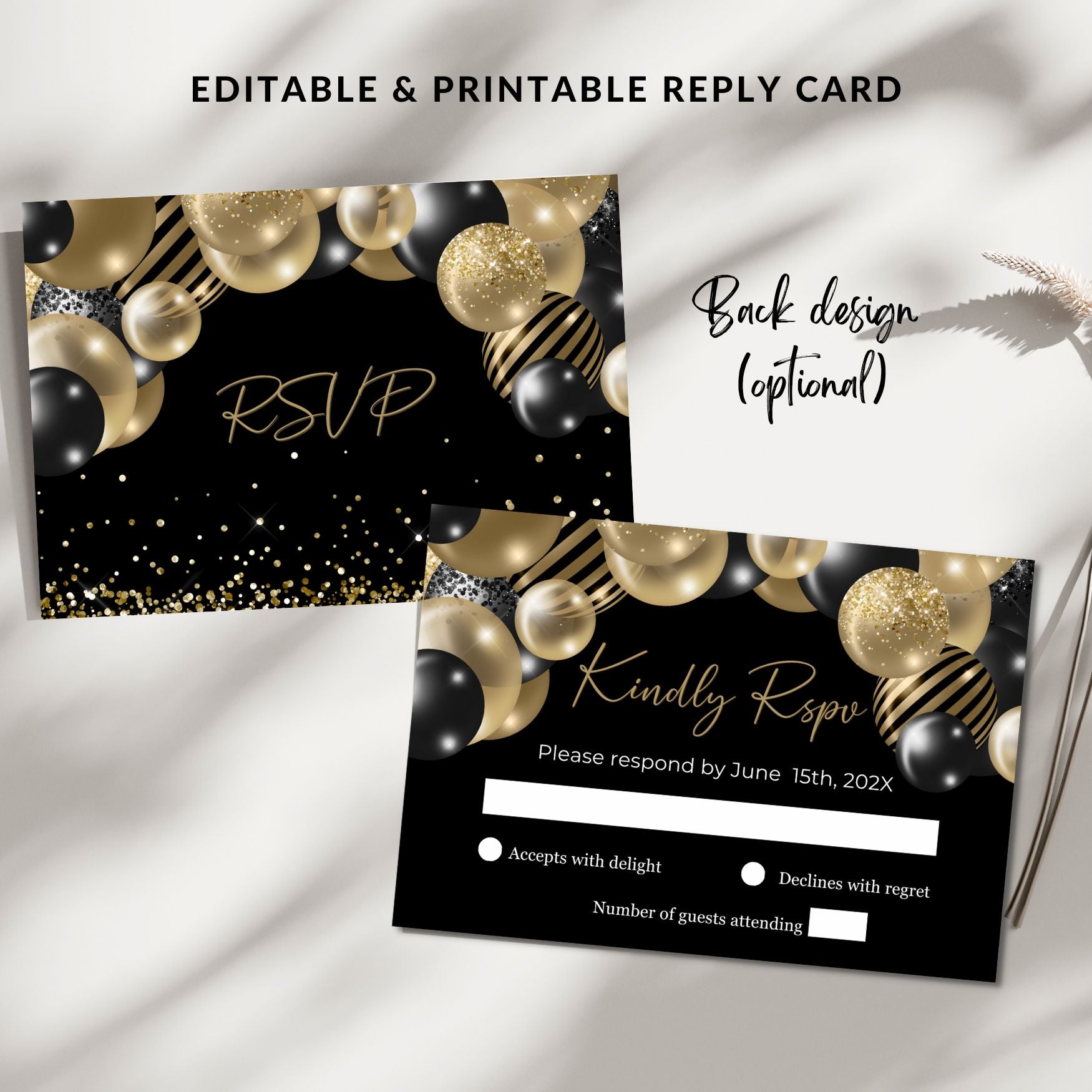 Black and gold RSVP card with decorative elements on a white fabric background