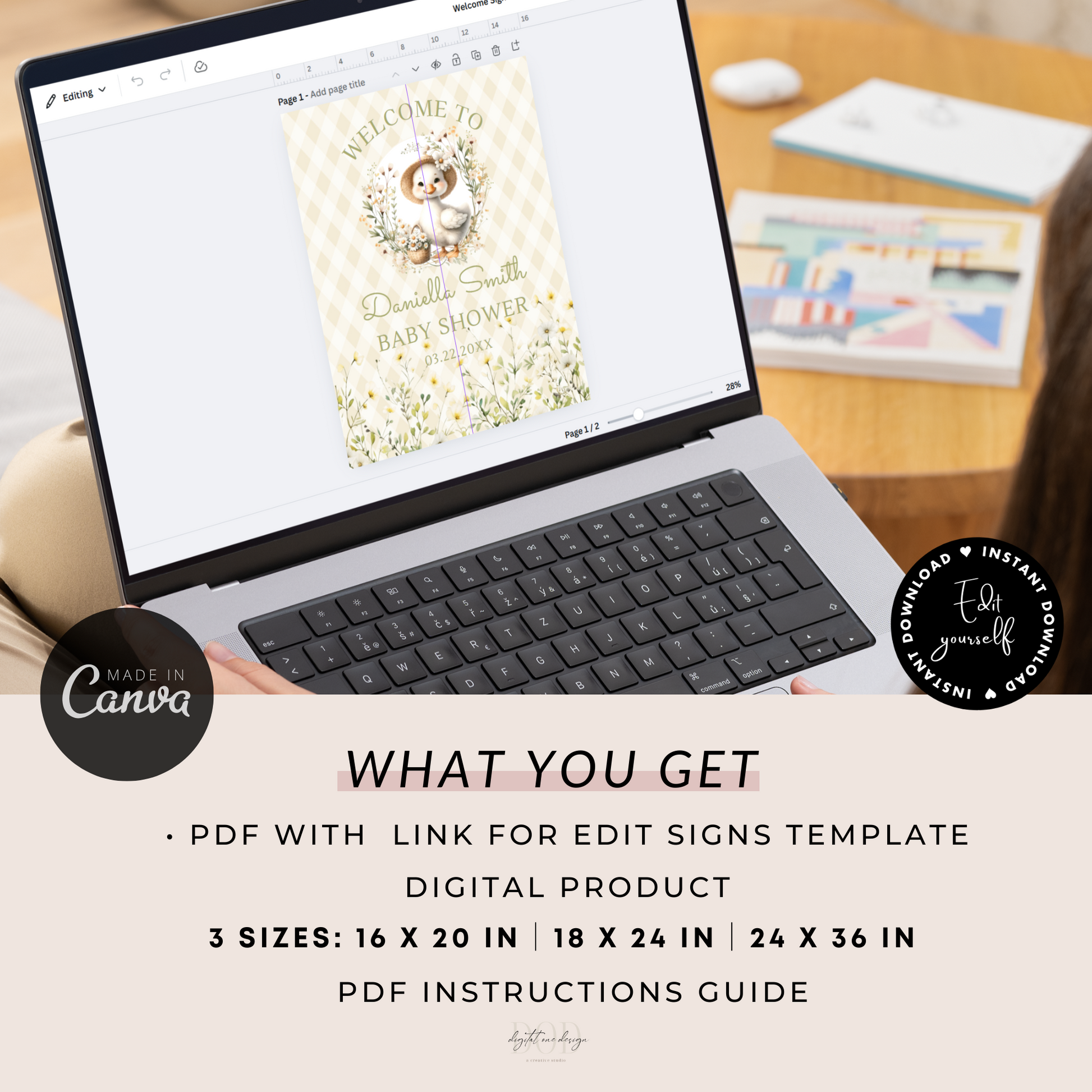 Laptop displaying a editable baby shower sign on a desk 