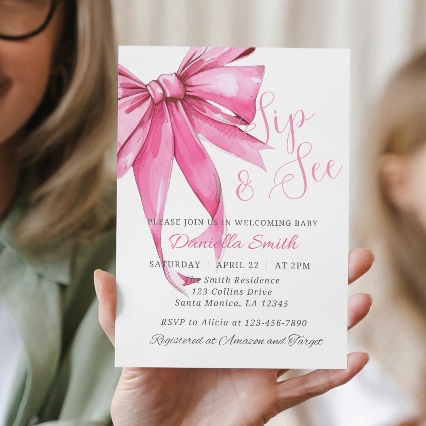 Baby shower invitation with watercolor pink bow 