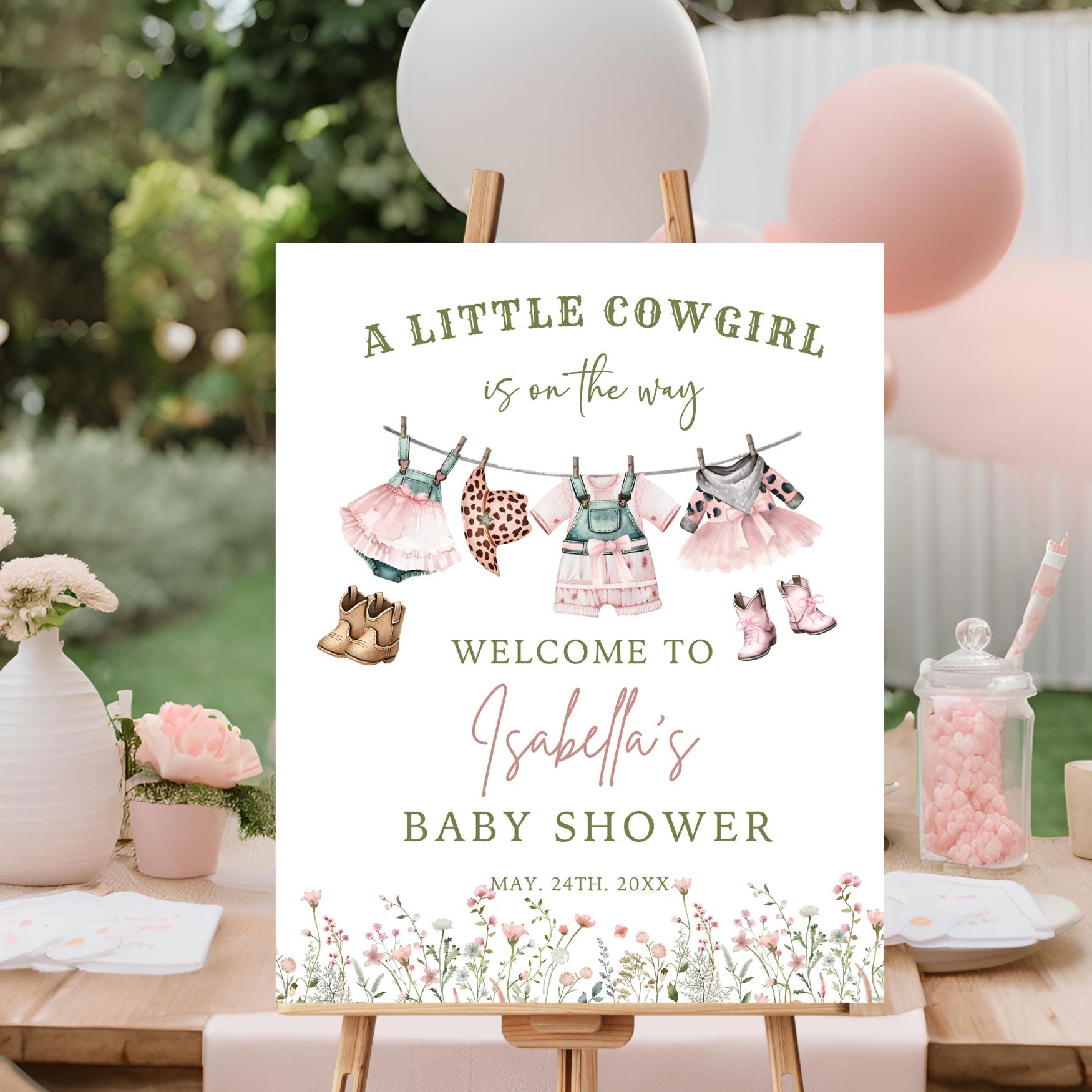 Baby shower sign for a little cowgirl theme with decorations and balloons.