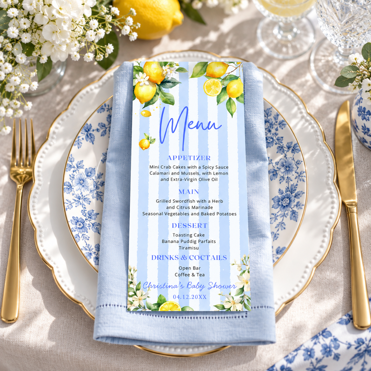 Editable Ciao Baby Citrus Lemon Menu Card on a table setting with floral accents and a blue napkin.