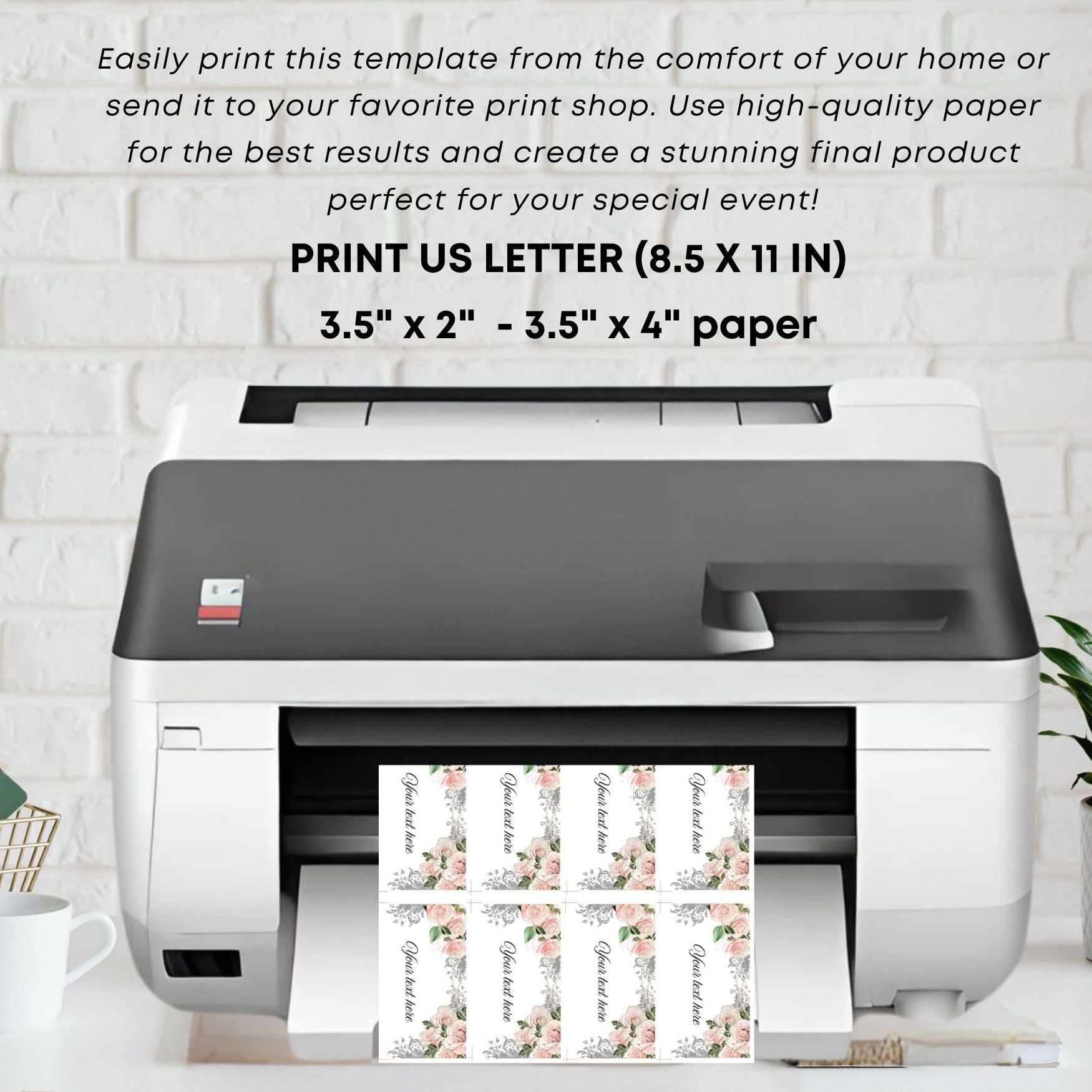 Printer with printed place cards on a white brick wall background