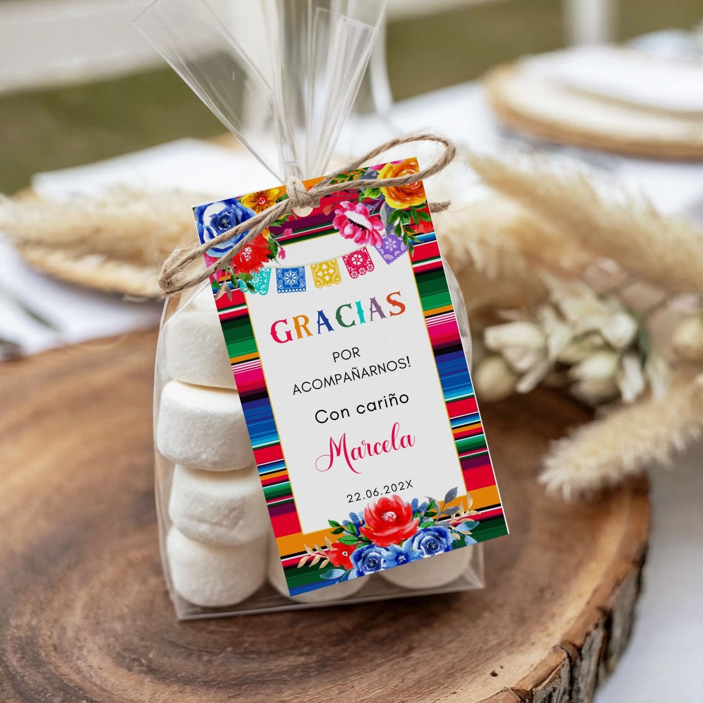 Packaged treat with a colorful Mexican Fiesta "Gracias"  tag on a wooden surface
