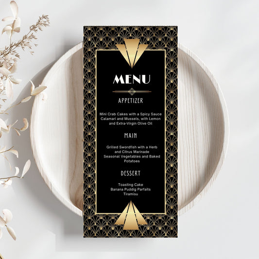 Black and gold Gatsby menu card on a white plate with decorative elements.