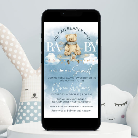 Electronic Cute Bear Pilot Baby Shower Invitation with a teddy bear and clouds on a smartphone screen.