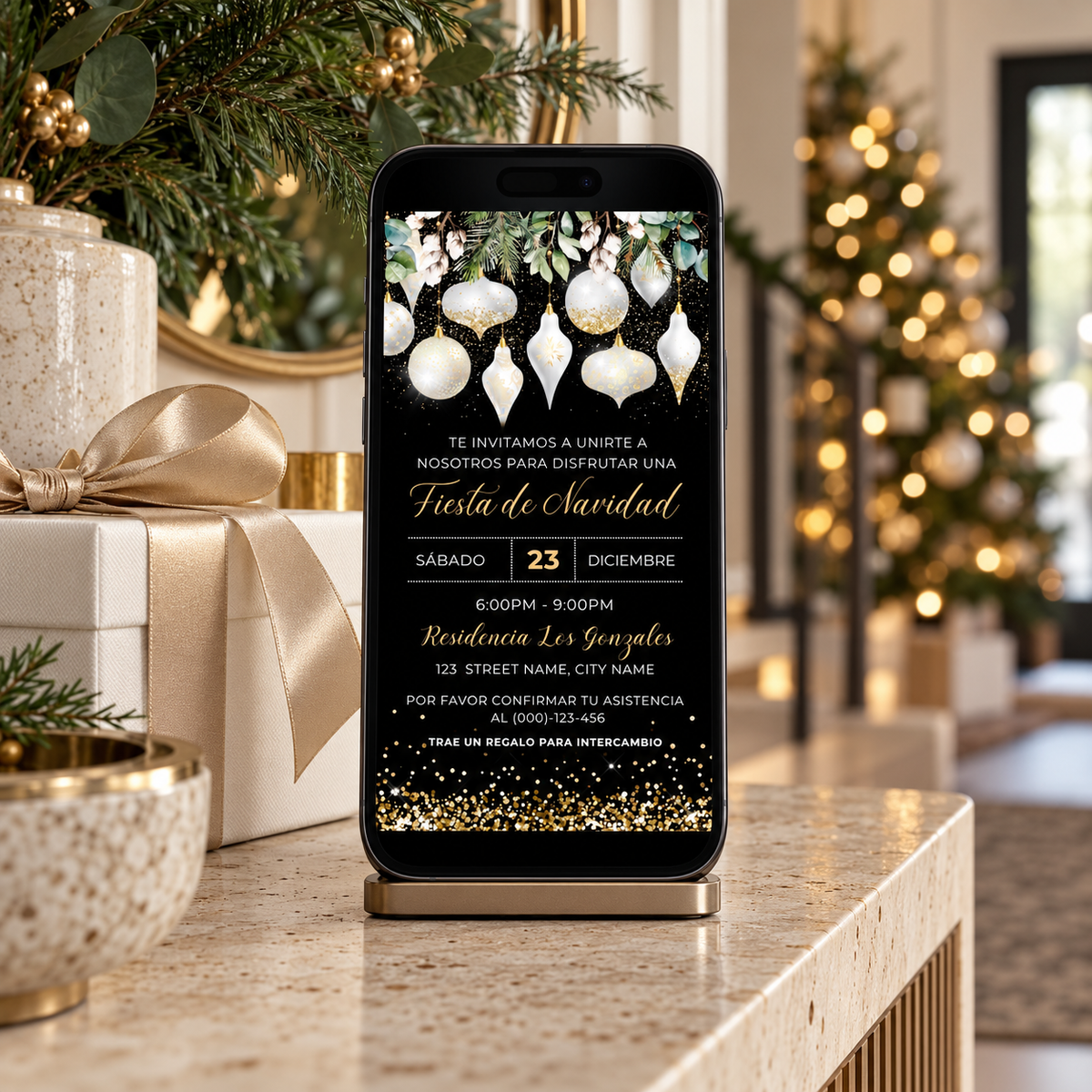 Elegant White Gold Christmas Ornaments Invitation displayed on a mobile phone in a festive setting with Christmas decor.
