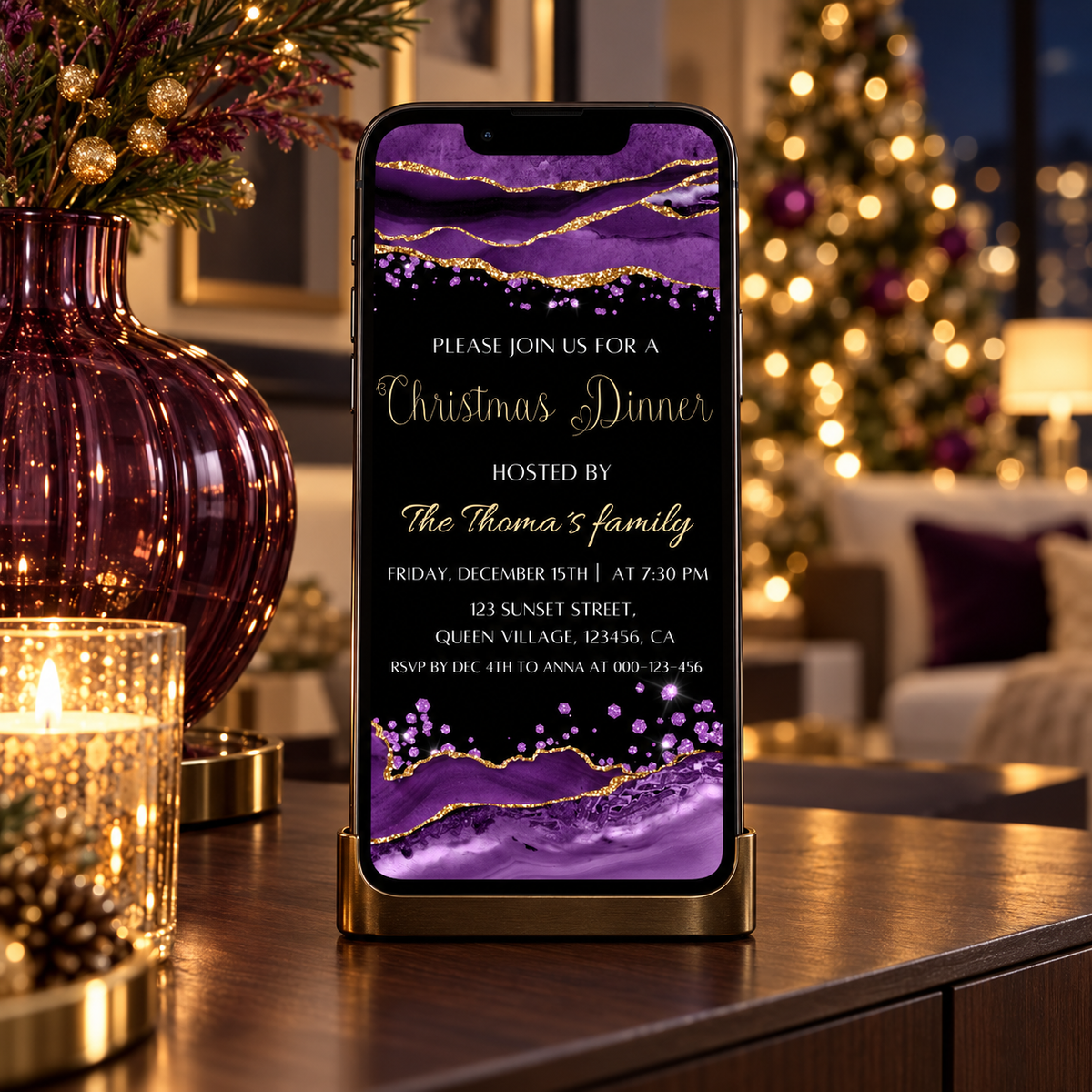 Purple Agate Christmas Dinner Invitation Template displayed on a smartphone next to festive holiday decor.