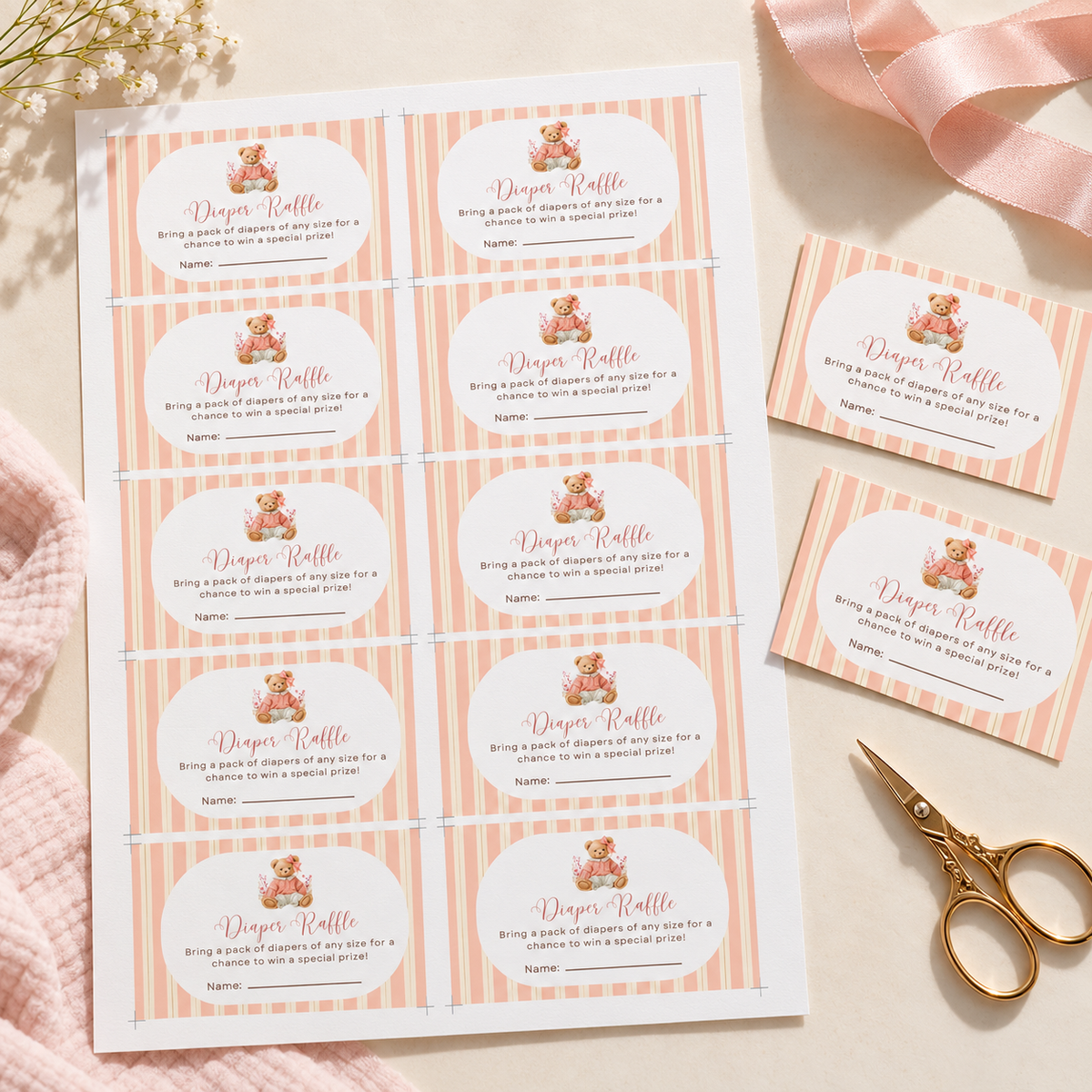Pink Teddy Bear Baby Shower Invitation Bundle diaper raffle cards and tags on striped background with scissors and ribbon